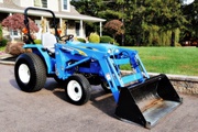 2009 New Holland T1510 with 110TL loader, just 117 hrs
